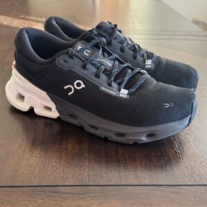 On Running Black and White Athletic Shoes